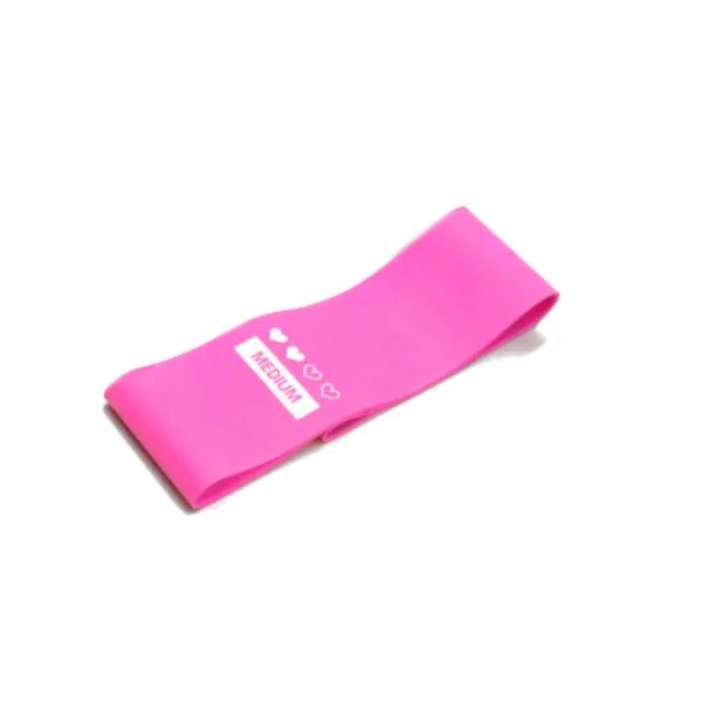 Pink medium resistance band with heart details, elegant fitness accessory for mindful movement