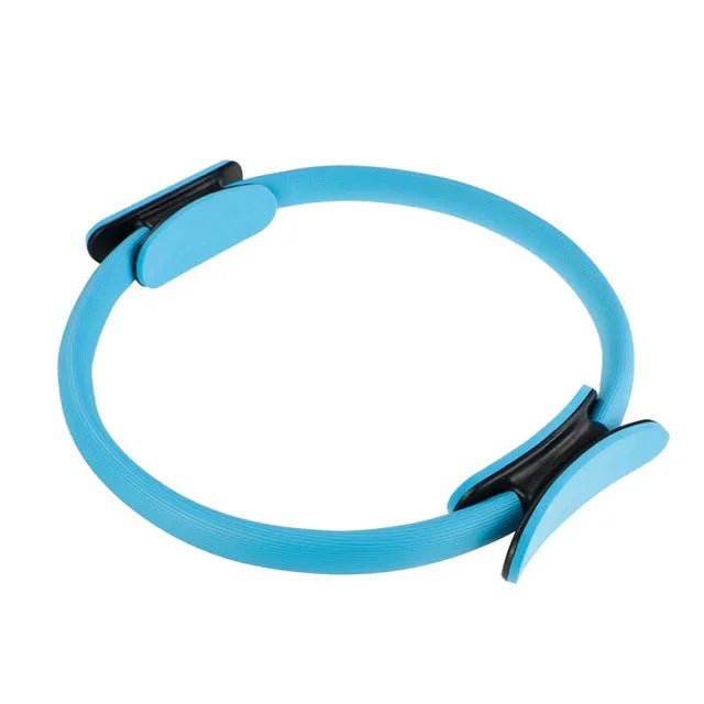 Elegant blue Pilates ring with black grips for graceful fitness routines