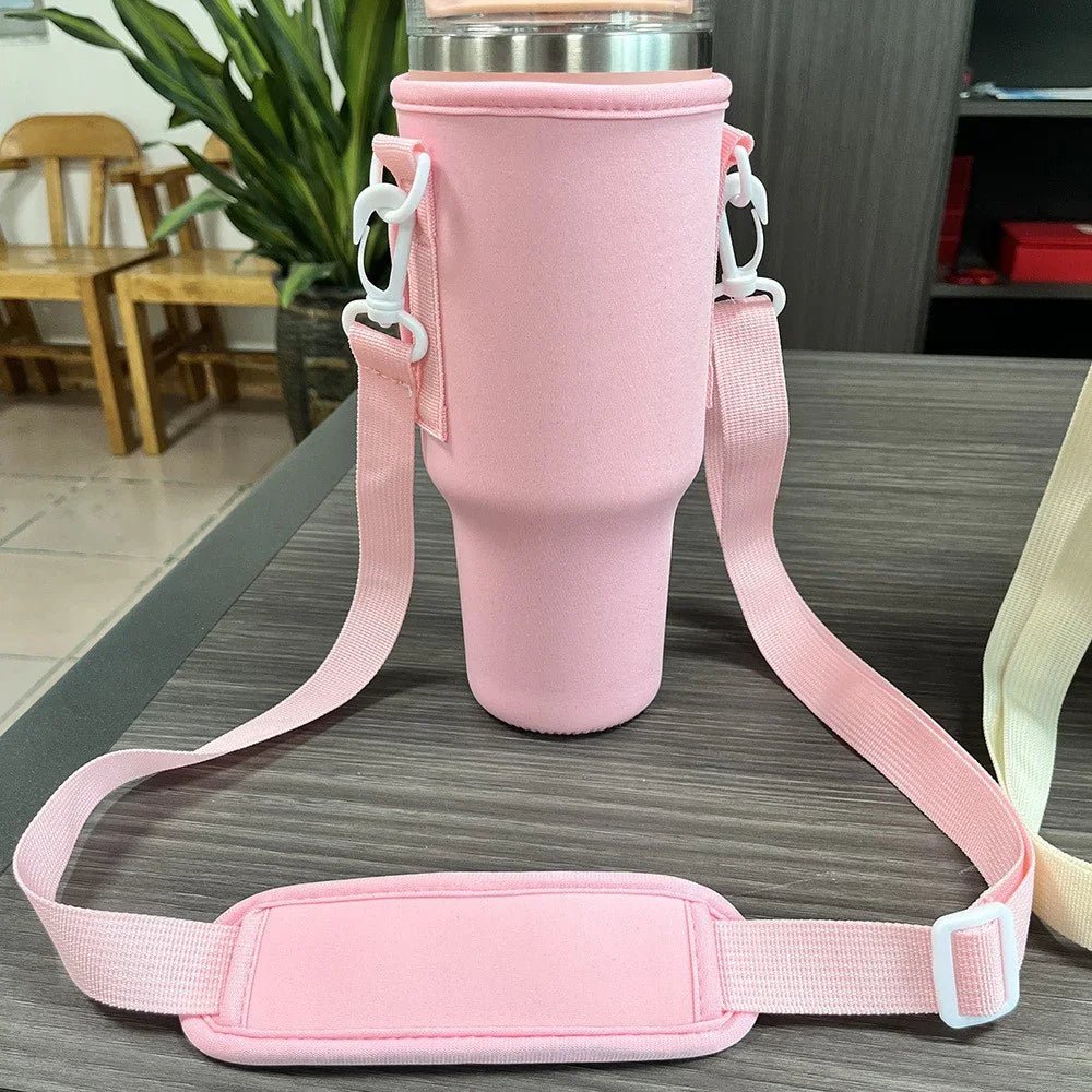 Soft pink neoprene tumbler sleeve with adjustable strap, elegant for daily faith-inspired living
