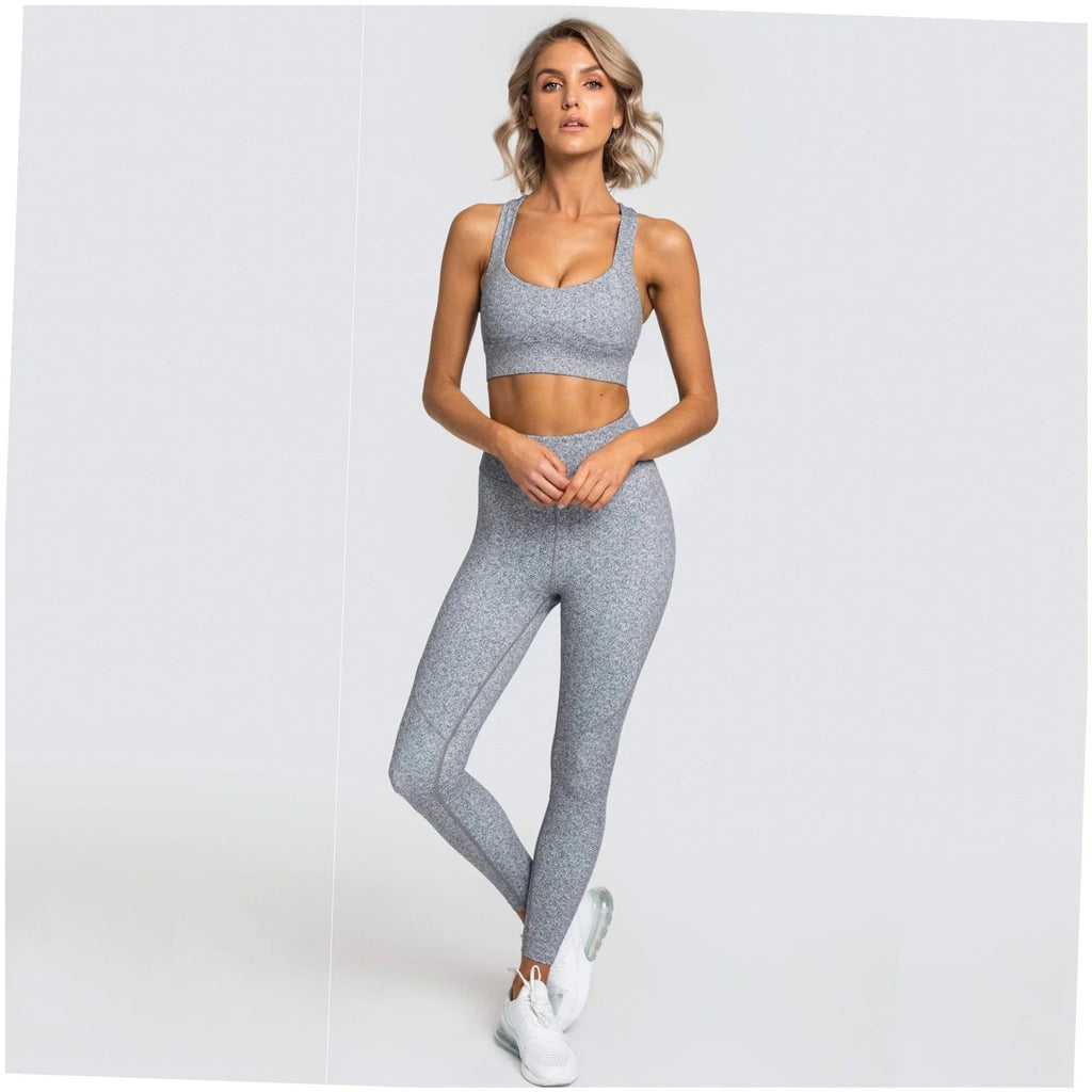 Elegant gray marled sports bra and leggings set with white sneakers, perfect for faith-inspired active living.