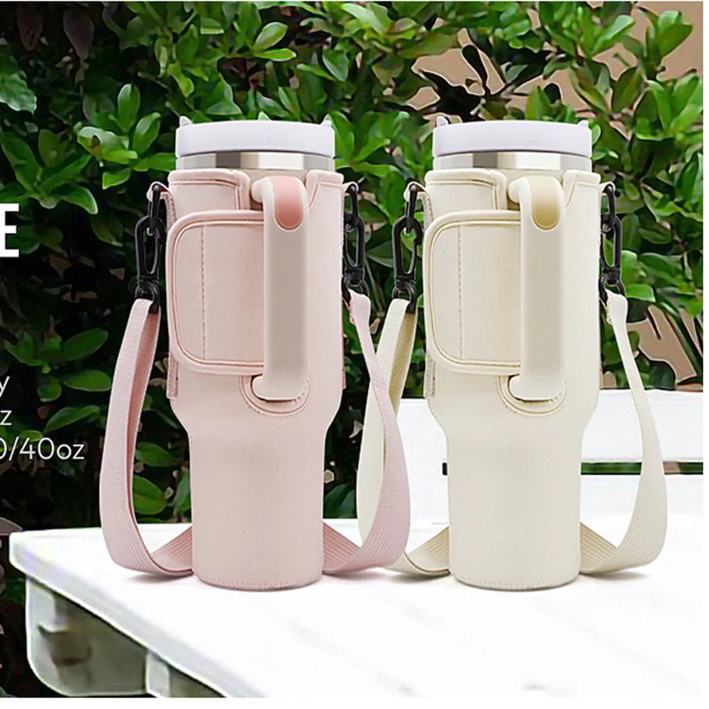Elegant blush and cream insulated tumblers with crossbody straps, styled for faith-filled, graceful living.