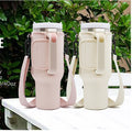 Elegant blush and cream insulated tumblers with crossbody straps, styled for faith-filled, graceful living.
