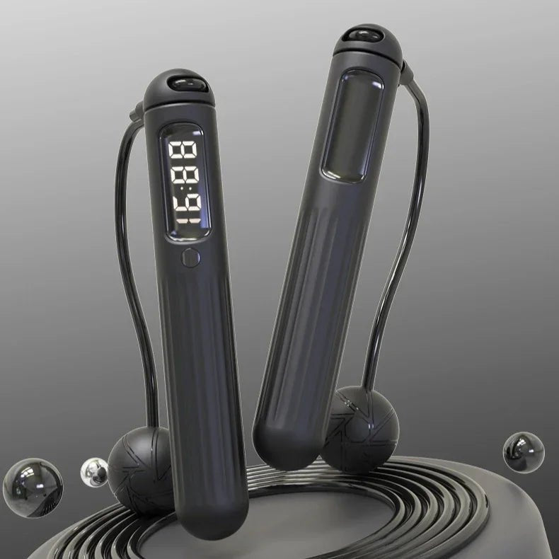 Elegant black digital jump rope with LED display, designed for mindful fitness and refined wellness routines.