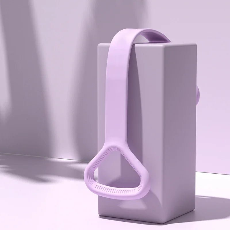 Elegant lavender resistance band with textured grip, styled on a minimalist block for serene fitness.